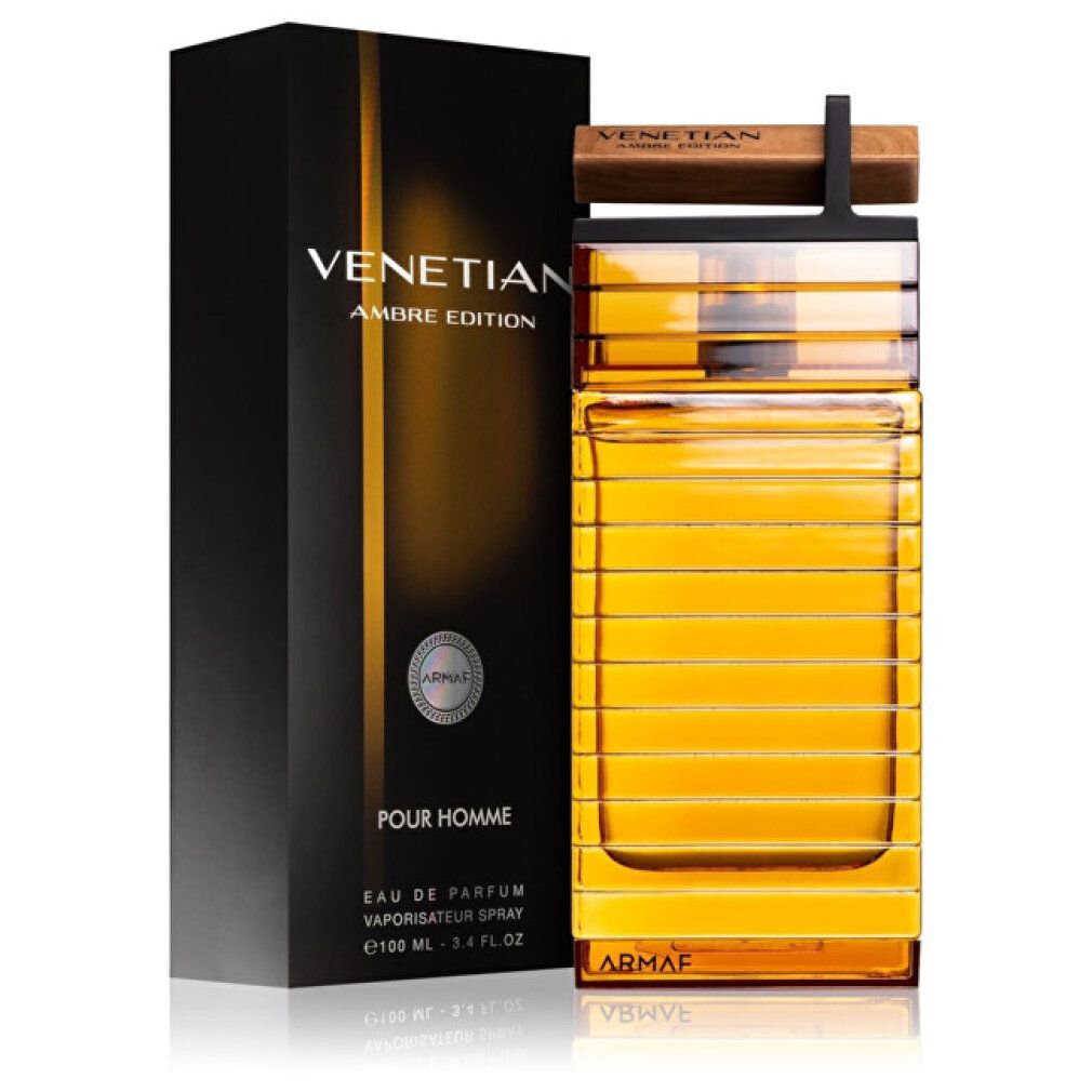 Parfümflakon und Verpackung. Flakon rechteckig, bernsteinfarben, mit Holzaufsatz. Verpackung schwarz mit goldfarbenem Text: Venetian Ambre Edition.