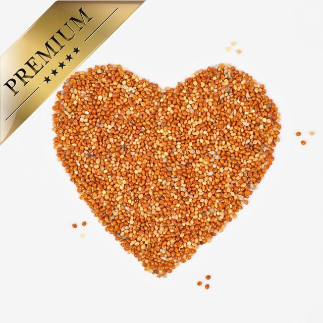 Hirse rot lose in Herzform. Aufschrift: PREMIUM.