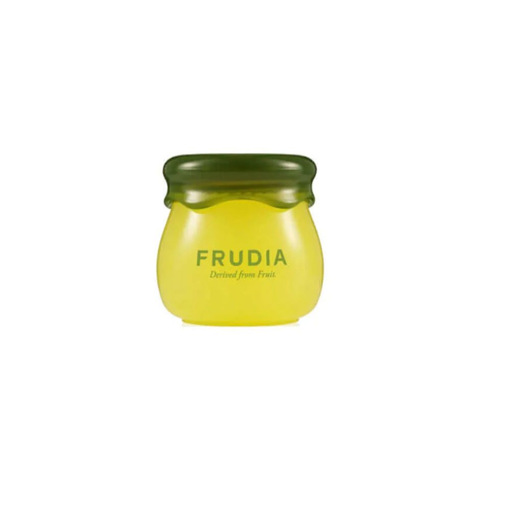 Gelber Lip Balm in einem kleinen Glas mit grünem Deckel. Aufschrift FRUDIA.