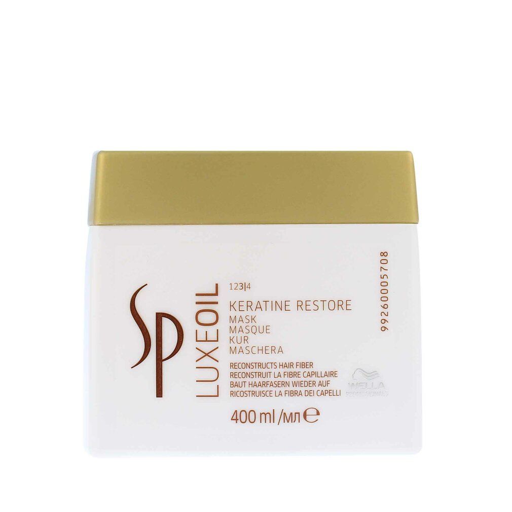 Weißer Tiegel mit goldfarbenem Deckel. Aufschrift: Keratin Restore Mask, Wella SP Luxeoil. 400 ml.