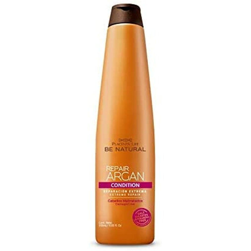 Orangefarbene Flasche mit braunem Deckel. Aufschrift: Be Natural Repair Argan Condition. Rosa Etikett mit Text.