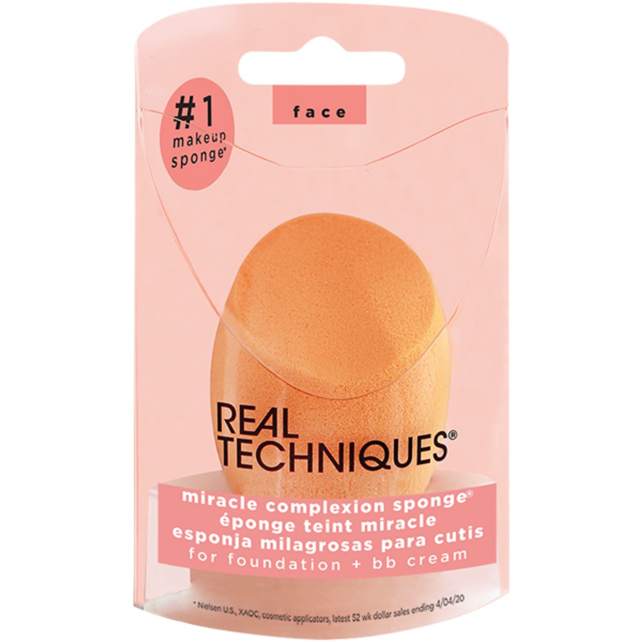 Verpackung mit orangefarbenem Make-up-Schwamm. Text: 'REAL TECHNIQUES', 'miracle complexion sponge'.