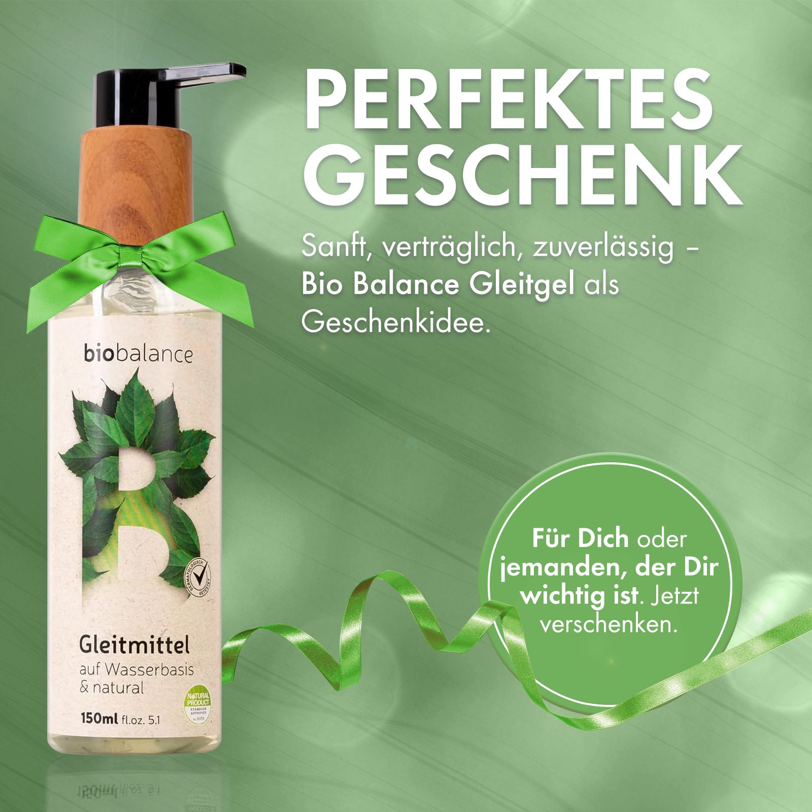 BIO BALANCE Gleitmittel-Flasche mit Schleife. Text: Perfektes Geschenk. Sanft, verträglich, zuverlässig. Geschenkidee.