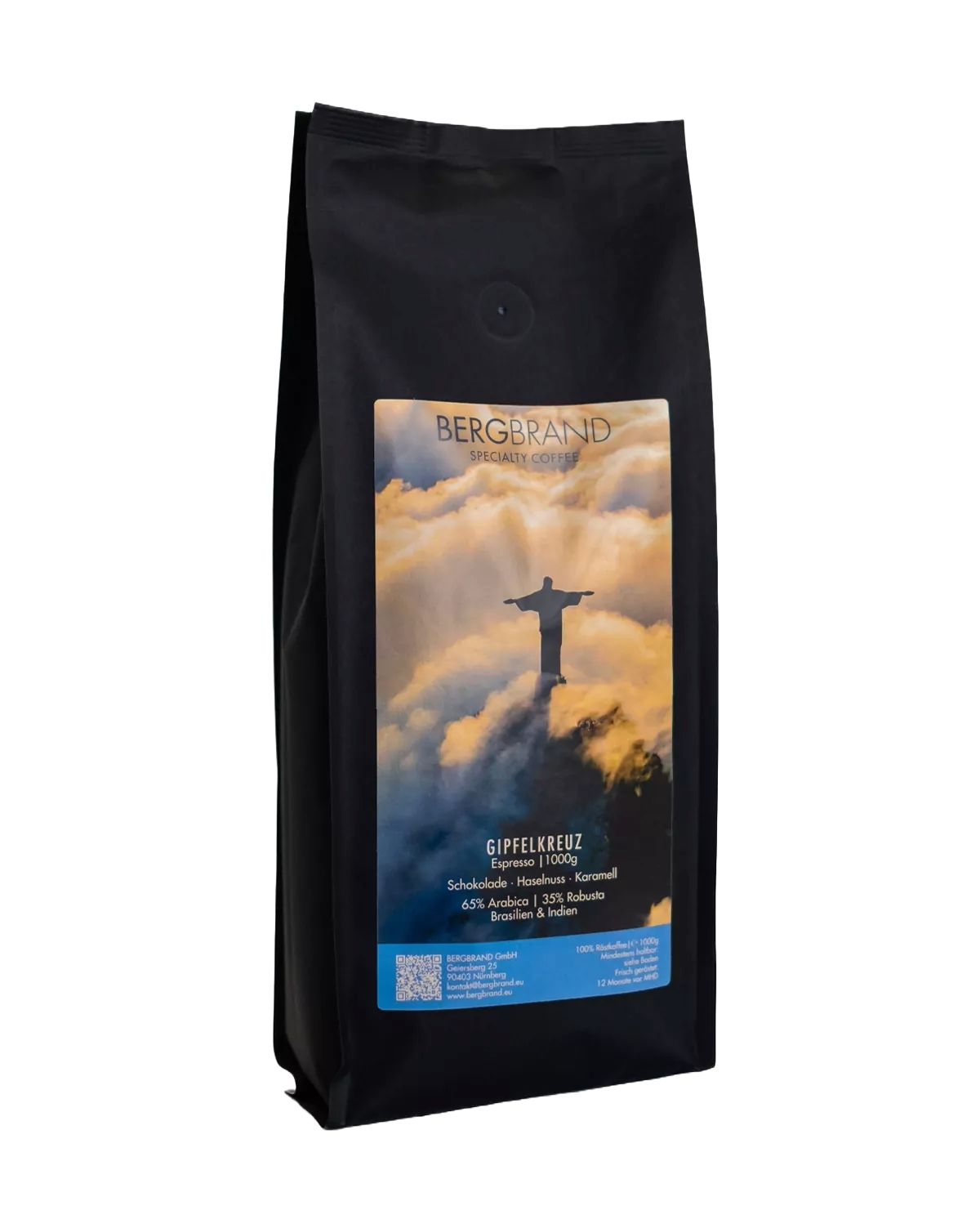 Schwarzer Beutel BERGBRAND Gipfelkreuz Espresso. Bild des Cristo Redentor. Text: 65% Arabica, 35% Robusta.
