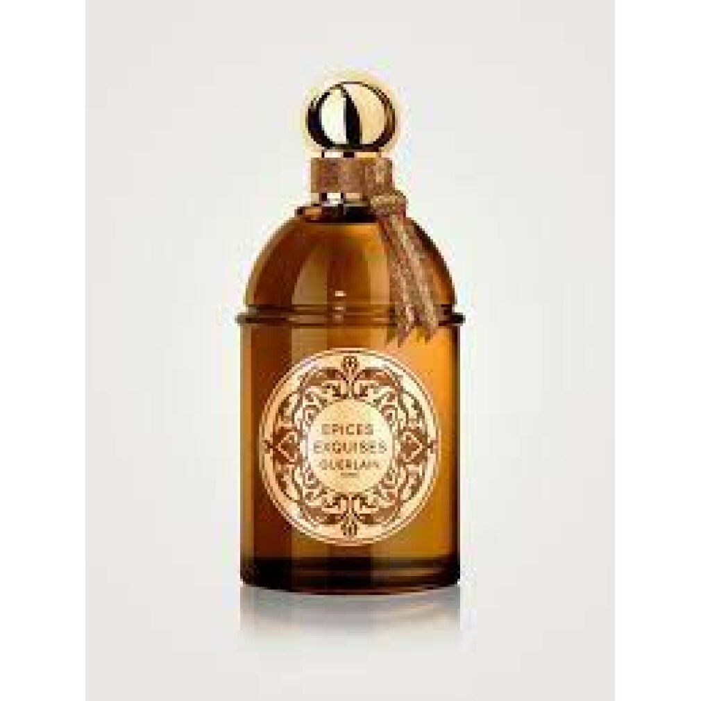 Braune Glasflasche mit goldenem Verschluss und Etikett. Aufschrift: Épices Exquises Guerlain.