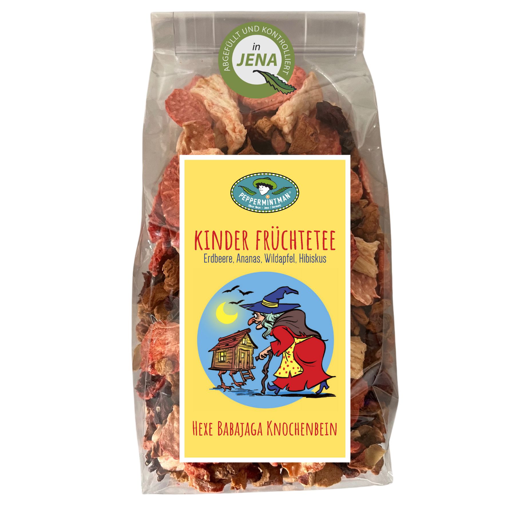 Klarsichtbeutel mit Früchtetee. Gelbes Etikett mit Logo, Text: Kinder Früchtetee, Hexe Babajaga Knochenbein. Sichtbare Zutaten.