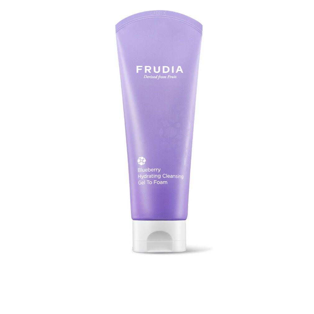 Lila Tube mit weißem Verschluss. Aufschrift FRUDIA und Produktbezeichnung. Blaubeer-Motiv.