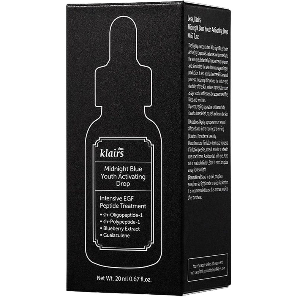 Schwarze Schachtel mit Produktabbildung und Text. Auf der Schachtel steht "Midnight Blue Youth Activating Drop".