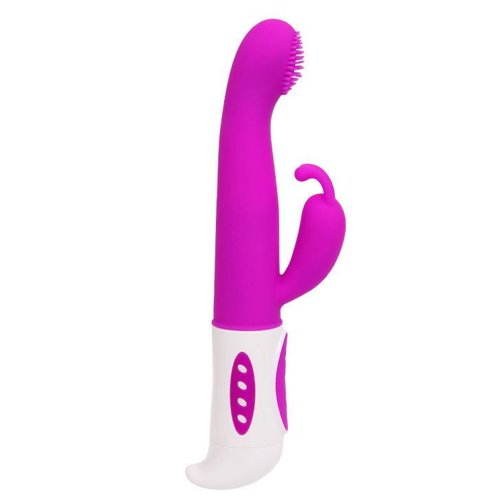Lila Vibrator mit weißem Griff. Bürstenkopf, zwei seitliche Elemente. Drei Knöpfe am Griff.