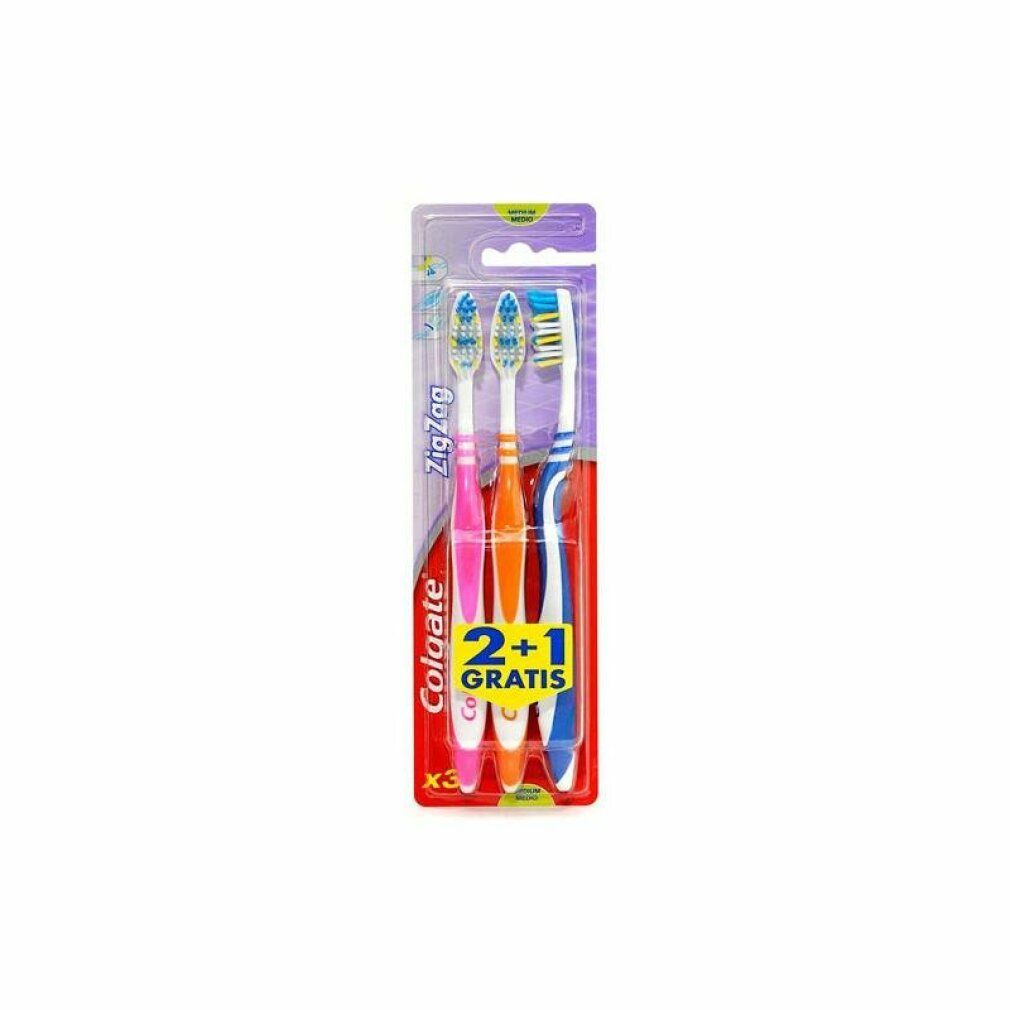 Zahnbürsten-Packung mit drei Colgate Zig Zag Bürsten. Farben: pink, orange, blau. 2+1 Gratis-Angebot. Sichtbare Marke und Produktname.