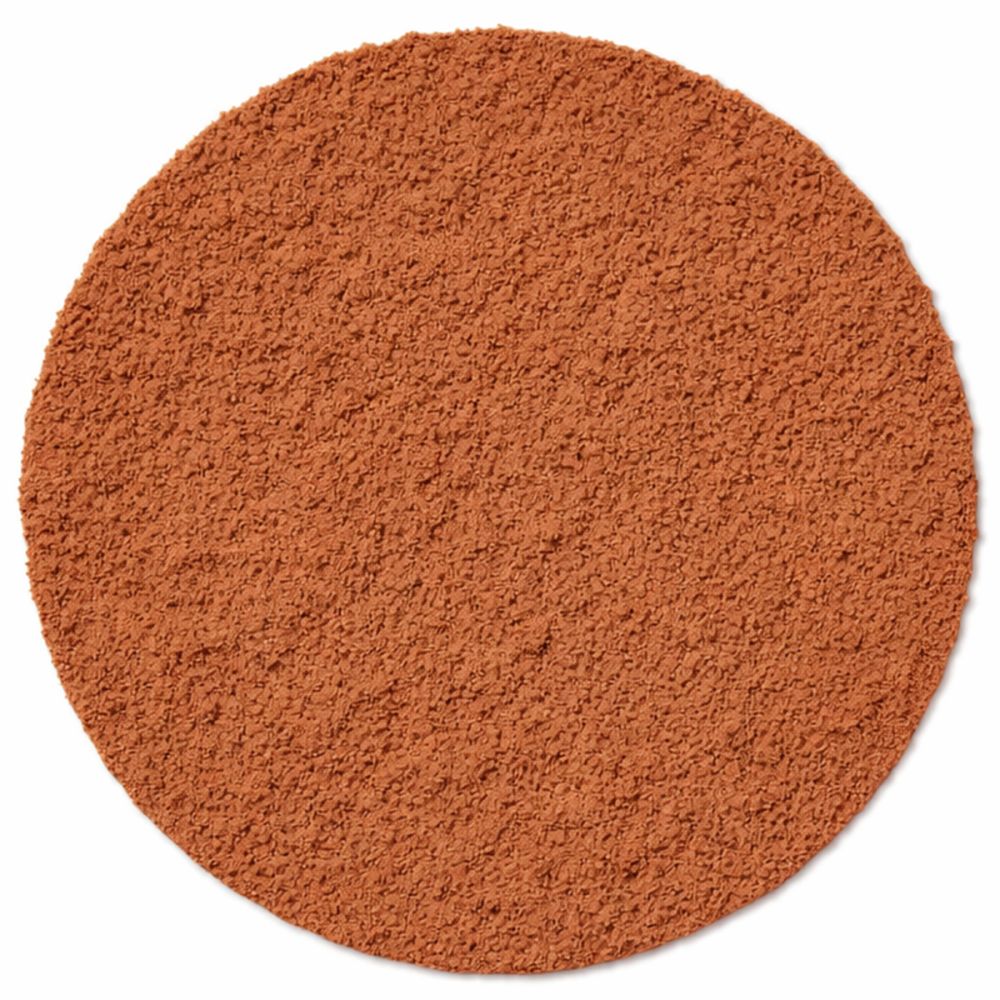 Runder, brauner Puder. Textur sichtbar. Keine Verpackung oder Beschriftung.