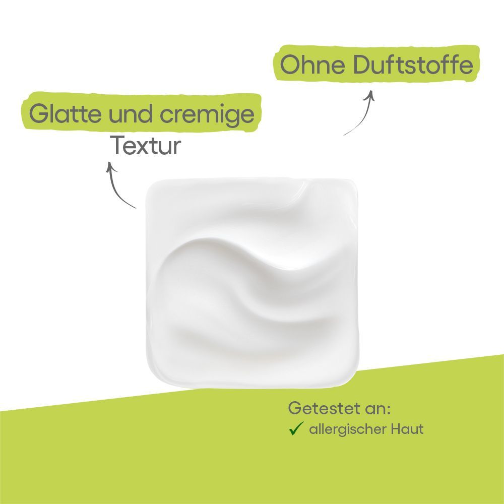 Weiße Creme-Textur auf weißem Hintergrund. Text: Glatte und cremige Textur, ohne Duftstoffe, getestet an allergischer Haut.