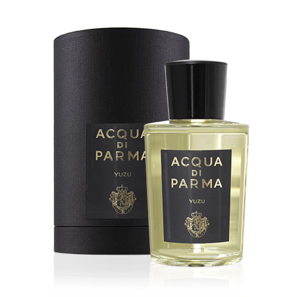 Acqua di Parma Yuzu Eau de Toilette Flakon und schwarzer Zylinderkarton mit goldenem Schriftzug.