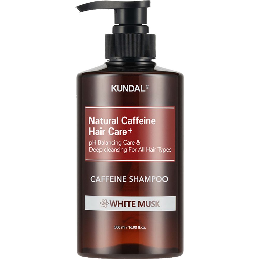 Braune Flasche mit schwarzem Pumpkopf. Aufschrift: KUNDAL, Natural Caffeine Hair Care+, Caffeine Shampoo, White Musk.