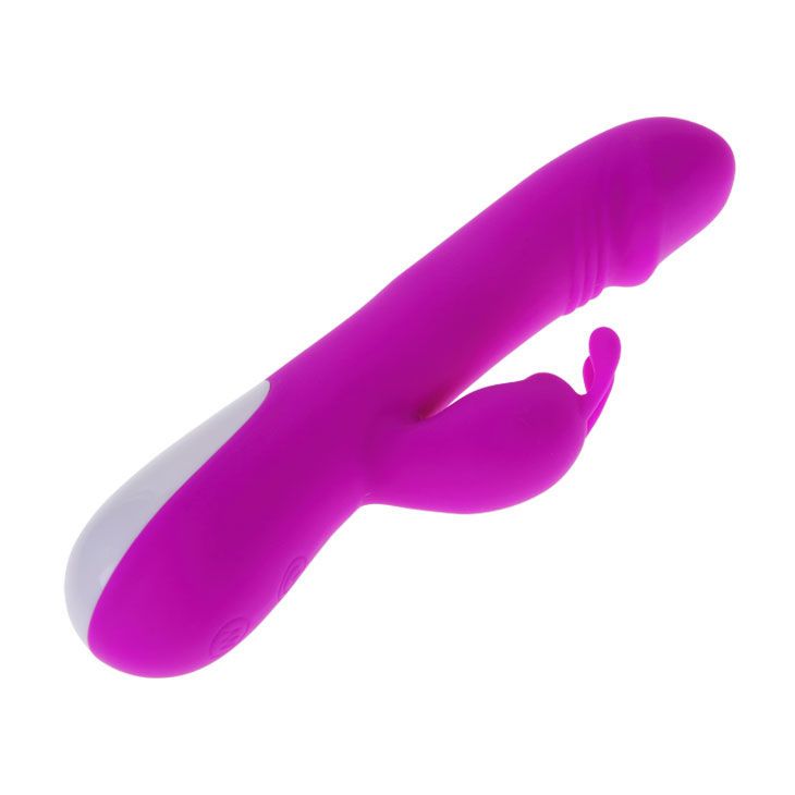 Lila Vibrator mit Klitoris-Stimulator. Weißer Akzent am unteren Ende. Auf weißem Hintergrund.