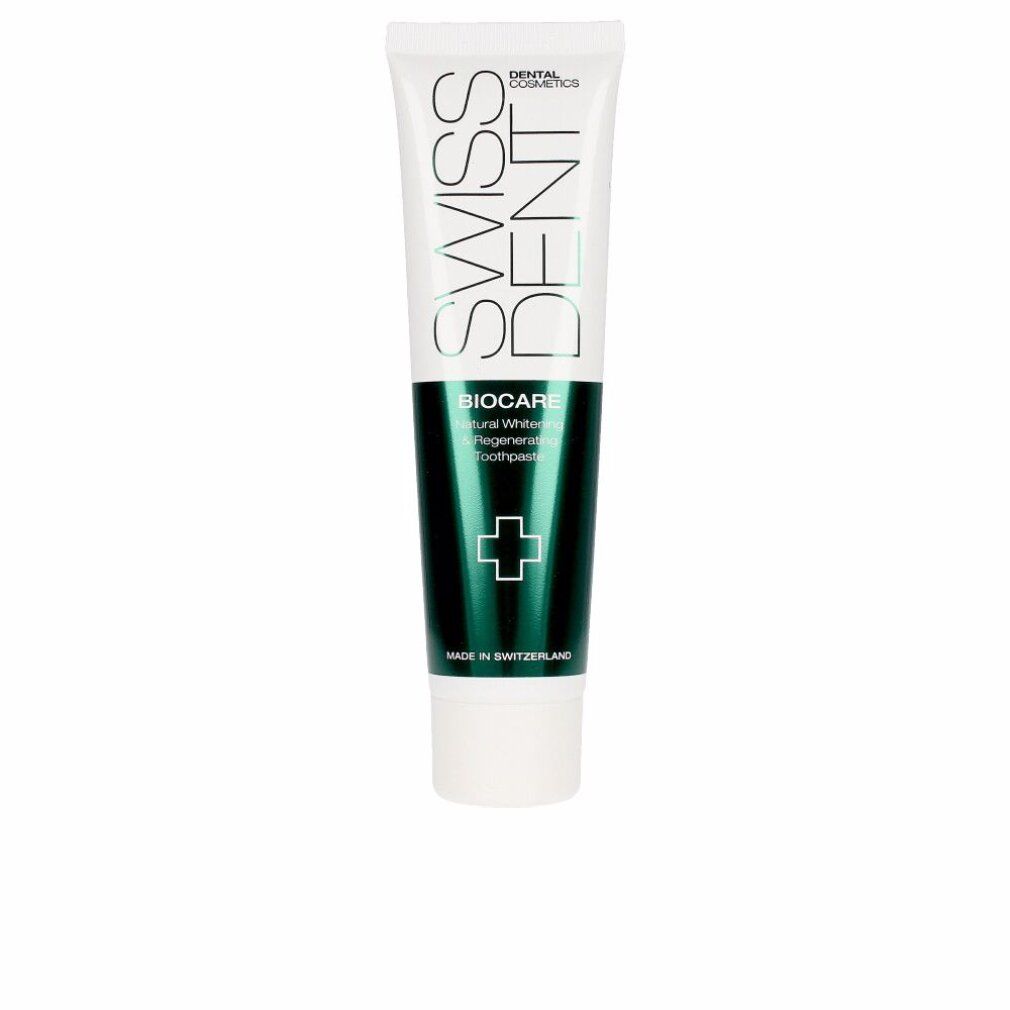 Zahncreme-Tube Swissdent Biocare. Weiß, grün, mit Logo und Kreuz. Hergestellt in der Schweiz.