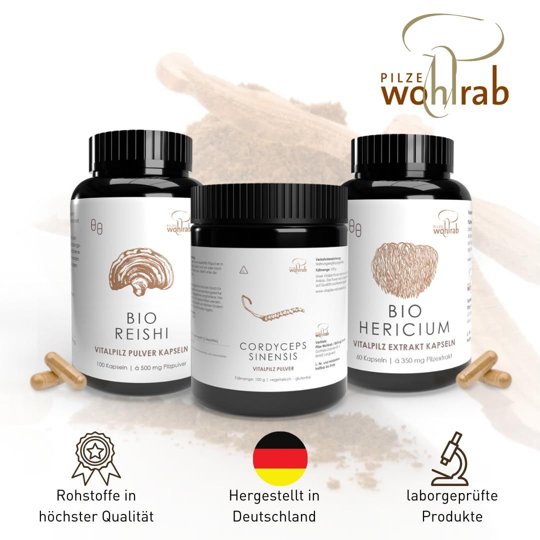 Drei Dosen Vitalpilz-Produkte: BIO Reishi, Cordyceps Sinensis, BIO Hericium. Logo Pilze Wohlrab.