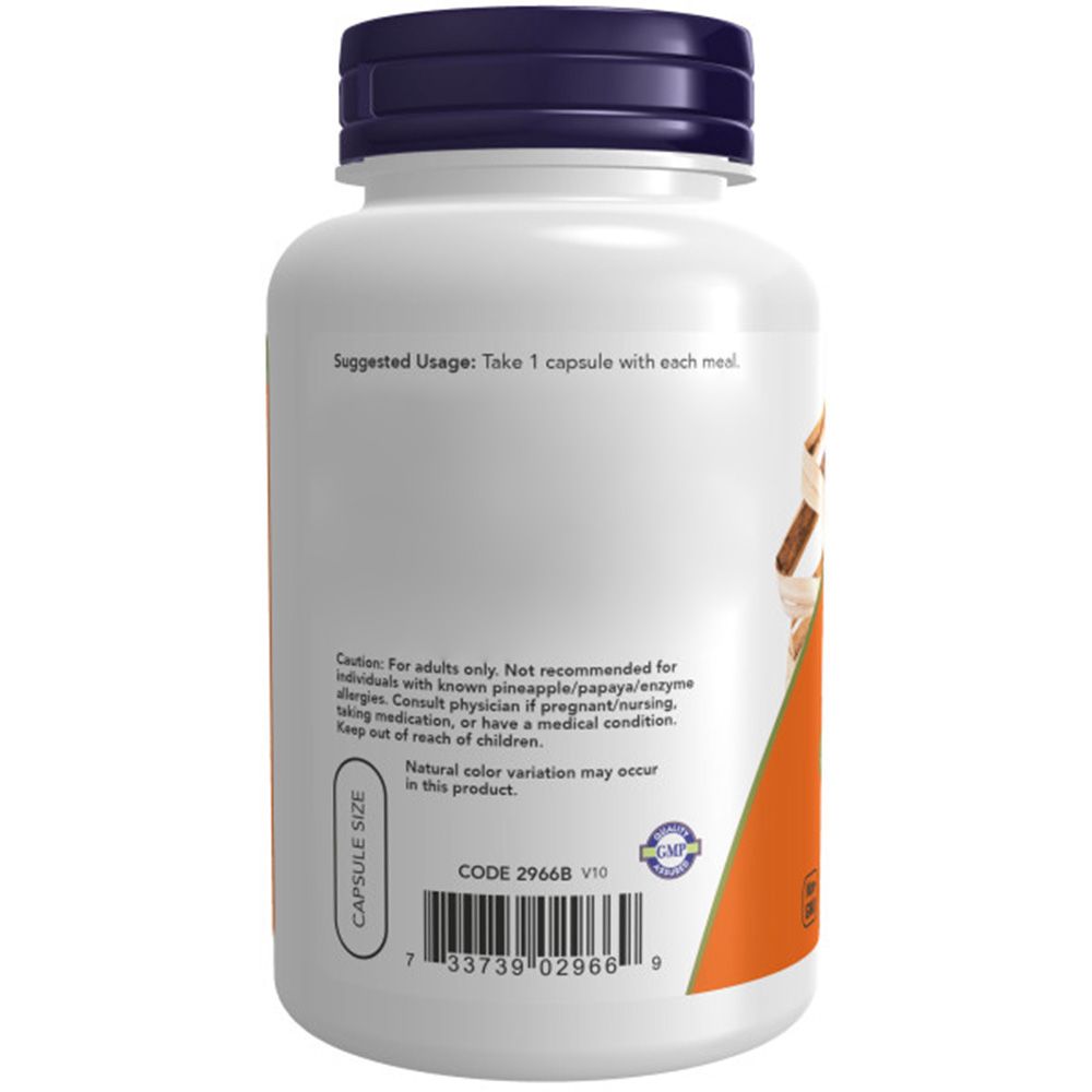 Weiße Flasche mit blauem Deckel. Aufschrift: Capsule Size. Barcode. Orangefarbener Aufkleber. Text: Suggested Usage: Take 1 capsule with each meal.