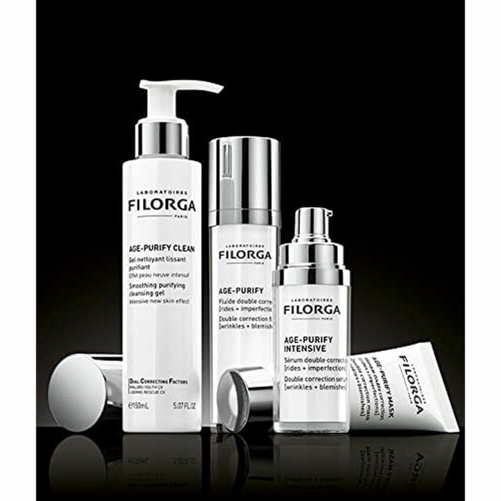 Produktreihe Filorga: Age-Purify Clean, Fluid, Intensive, Maske. Weiße Flaschen, silberne Deckel. Text: Age-Purify. Laboratoires Filorga Paris.