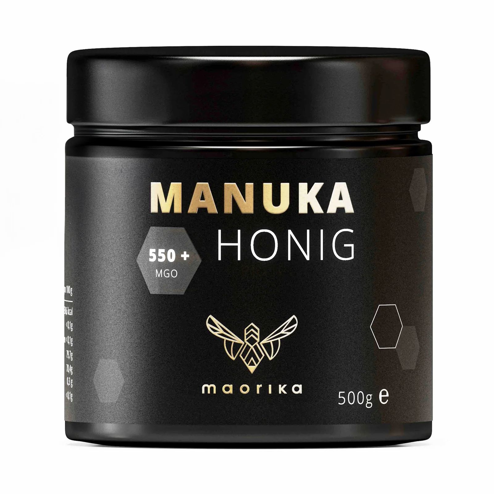 Schwarzes Glas mit "MANUKA HONIG"-Aufdruck, "550+ MGO" und "maorika"-Logo. 500g e.
