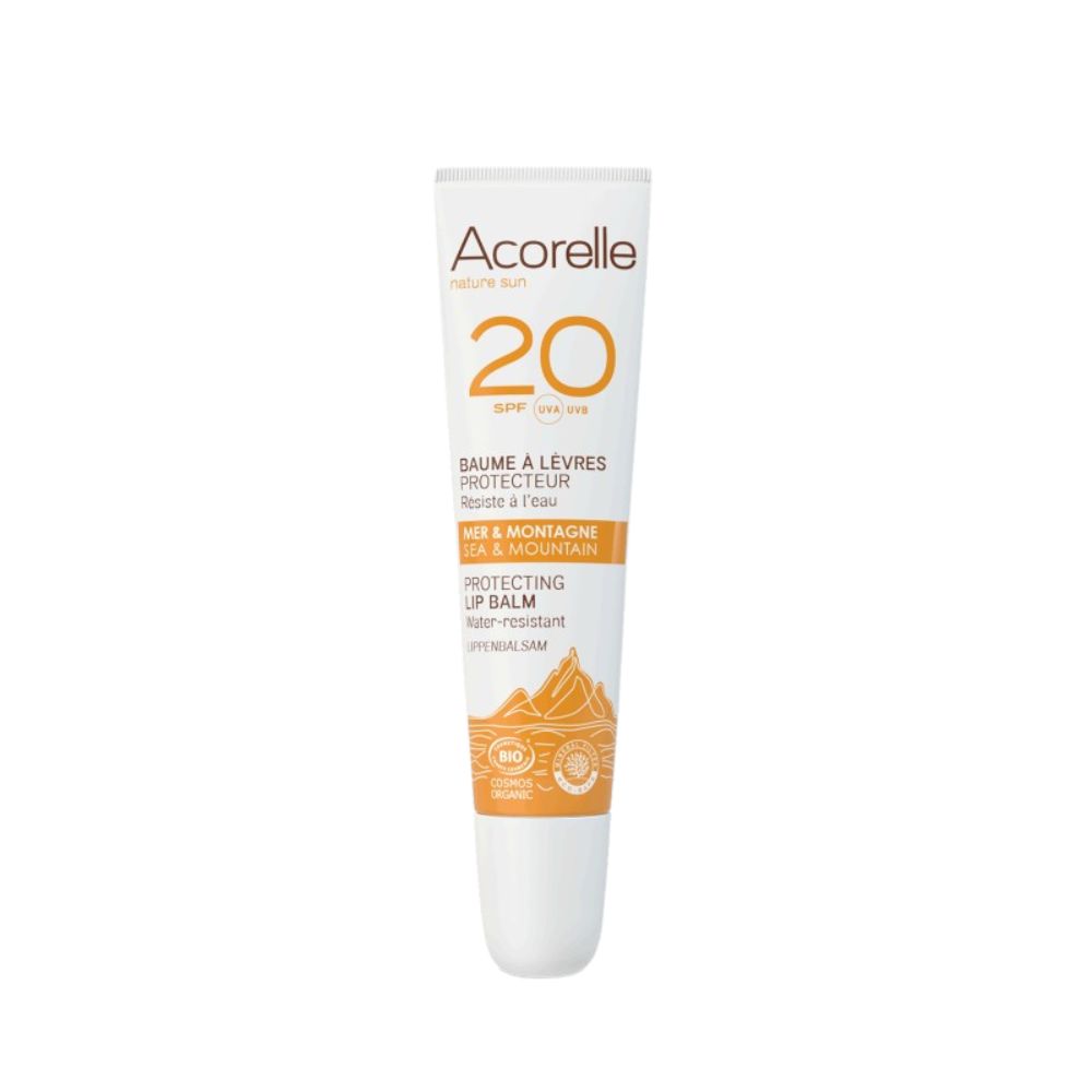 Weiß-orange Tube. Aufschrift: Acorelle, 20 SPF, Baume à lèvres protecteur, Meer & Berg, Protecting Lip Balm. Bio-Zertifizierung.