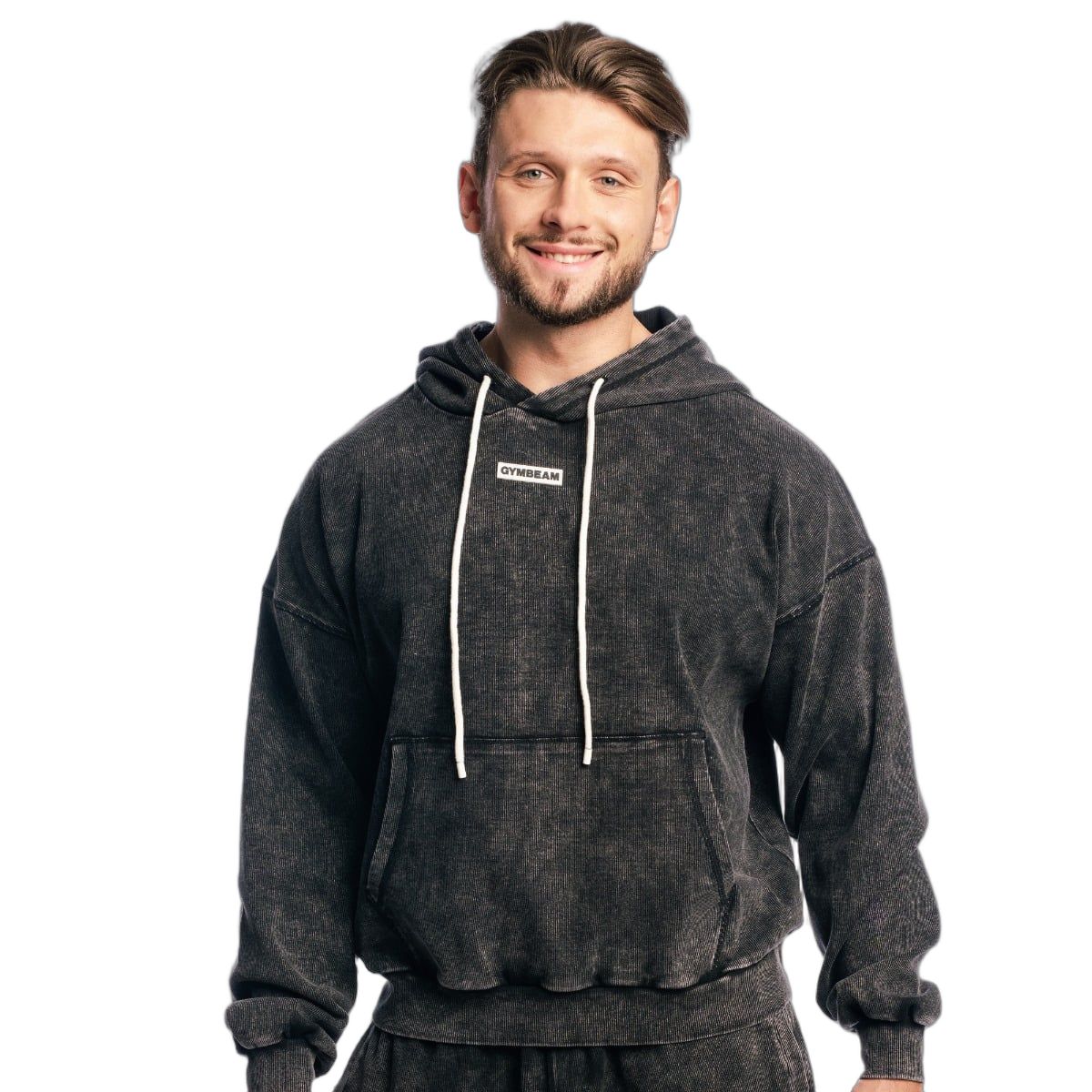 Herren Oversized Hoodie in verwaschenem Schwarz mit Kapuze und Kordelzug. Dezentes Logo-Patch auf der Brust.