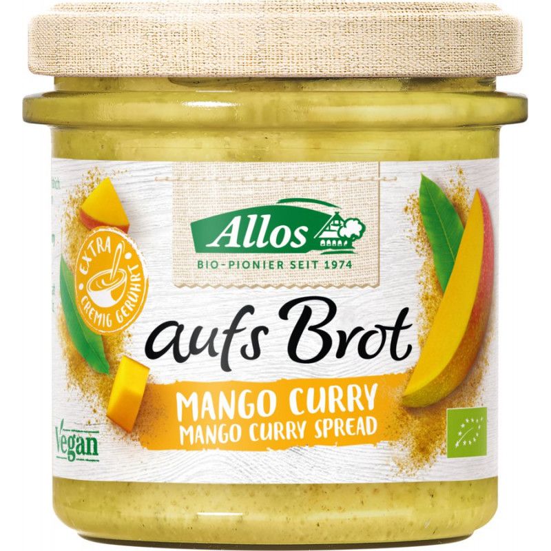 Glas mit Mango Curry Aufstrich. Aufschrift: Allos, Mango Curry, Bio-Pionier seit 1974. Mit Mango- und Blättern-Illustrationen.