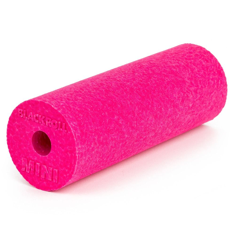 Pinkfarbener Mini-Roller mit Loch. Aufschrift 'BLACKROLL MINI'.