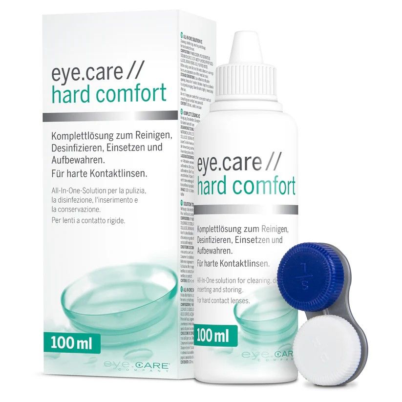 Flasche und Verpackung von eye.care // hard comfort. Enthält 100 ml. Mit Kontaktlinsenbehälter.