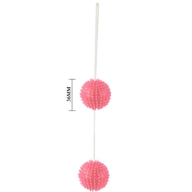 Zwei pinke Noppenbälle, 36mm Durchmesser, an einer Schnur.