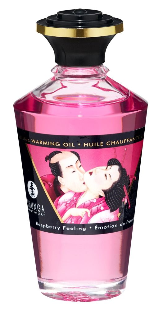 Rosa Massageöl-Flasche. Aufschrift: Shunga, Himbeer-Aroma. Abbildung: küssendes Paar. Flasche: Glas, schwarzer Deckel.