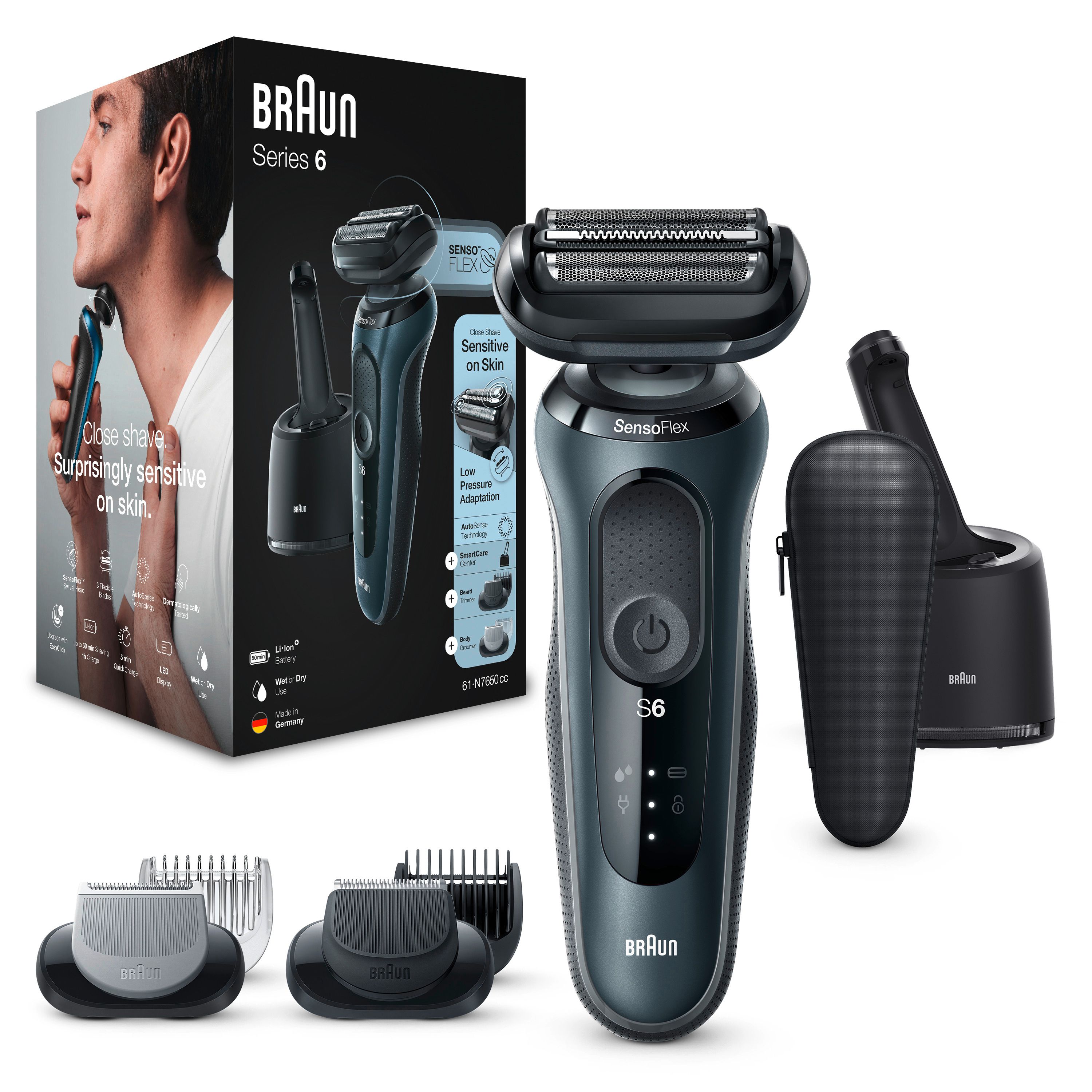 Elektrorasierer Braun Series 6, schwarz, mit Zubehör und Verpackung. Auf der Verpackung: Mann rasiert sich.