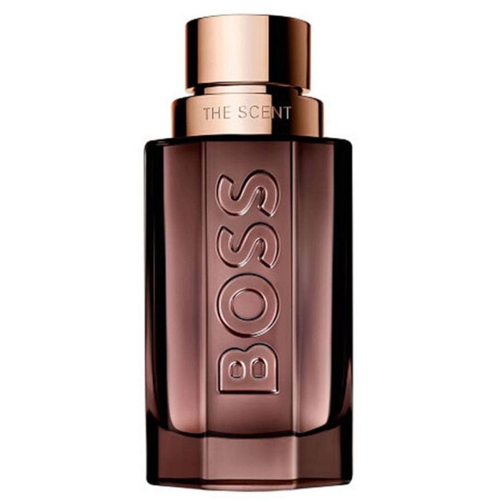 Parfümflakon mit BOSS-Logo und Aufschrift "THE SCENT". Braune Glasflasche mit kupferfarbenem Verschluss.