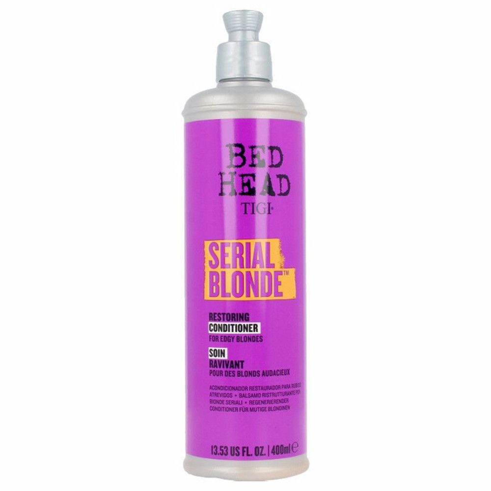 Violette Flasche mit silbernem Verschluss. Aufschrift: Bed Head Tigi Serial Blonde. Restoring Conditioner.