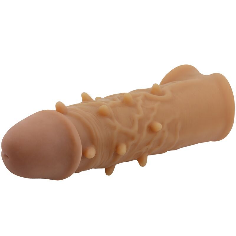 Penishülle mit Noppen und Hodensackring. Hautfarbenes Silikon. Geformt für den Penis. Ringförmige Basis.
