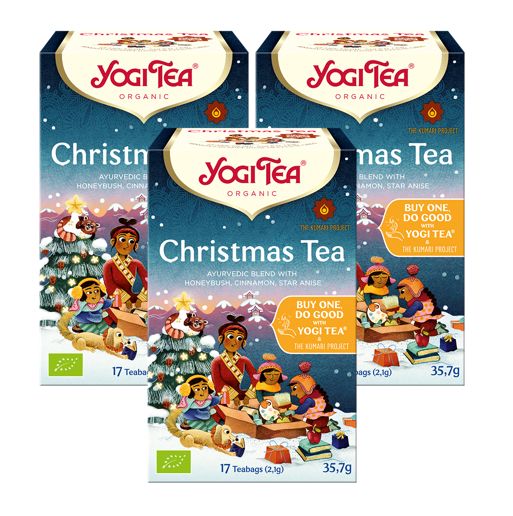 Drei Schachteln Yogi Tea Christmas Bio Gewürztee. Verpackung mit Wintermotiv, Logo und Text. 17 Teebeutel.