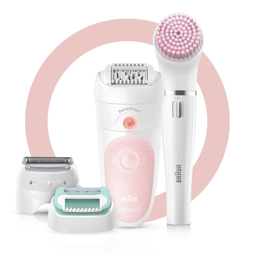 Epilierer, Gesichtsbürste und Trimmer. Weiß und rosa. Zubehör: zwei Aufsätze. Text: Braun Silk-épil 5.