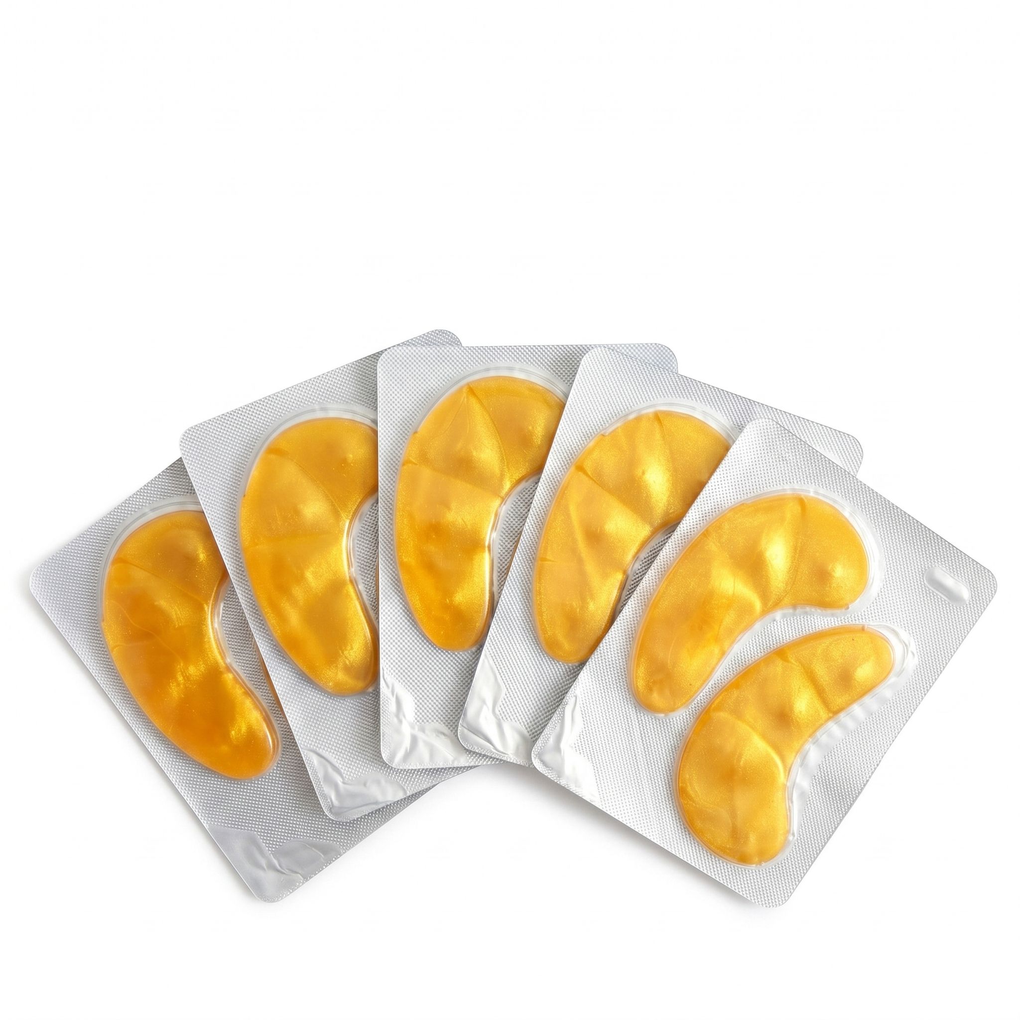 Fünf einzelne Packungen mit goldenen Augenpads, jeweils mit zwei Pads.