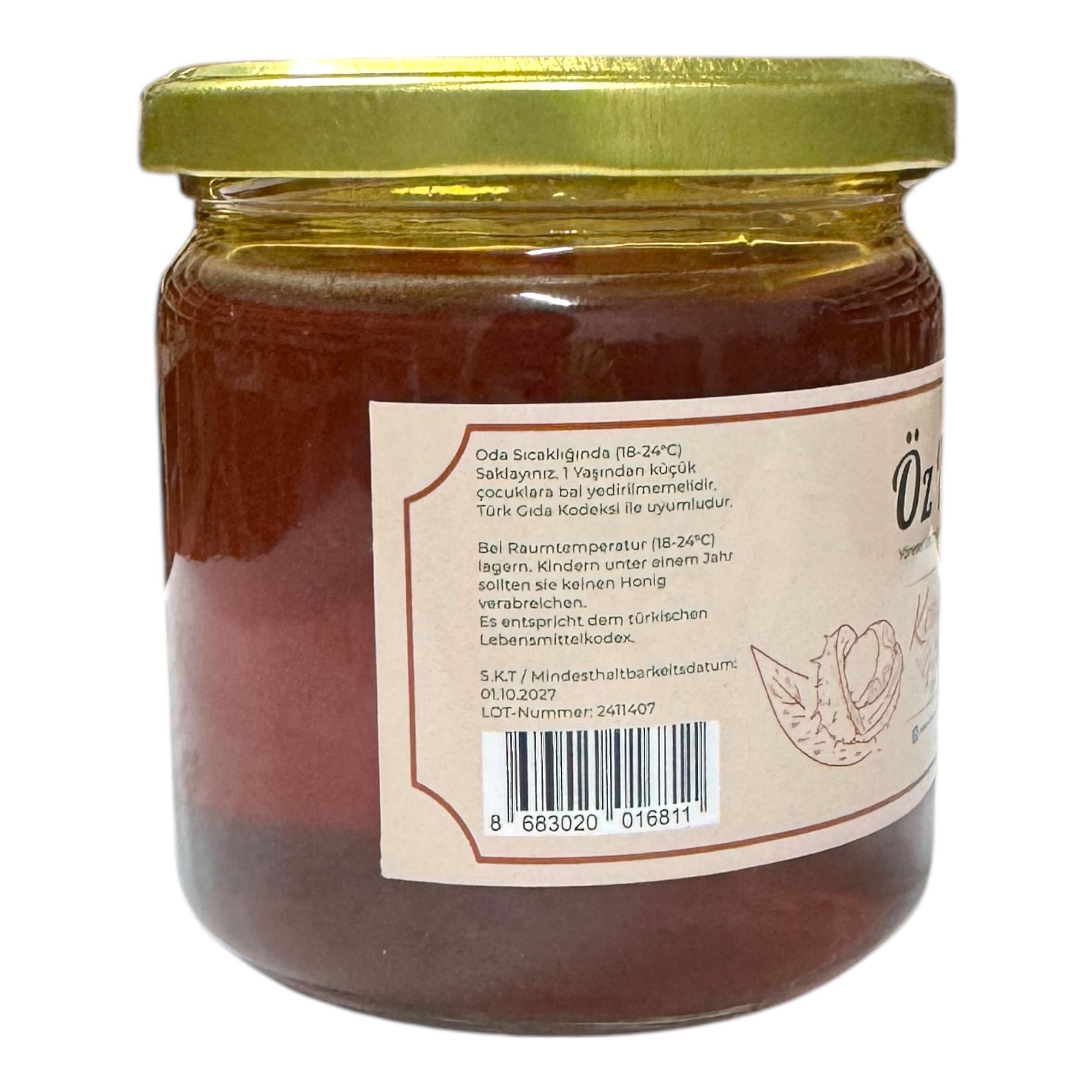 Rückseite eines Honigglases. Etikett mit Warnhinweisen und Mindesthaltbarkeitsdatum. Öz Natur.