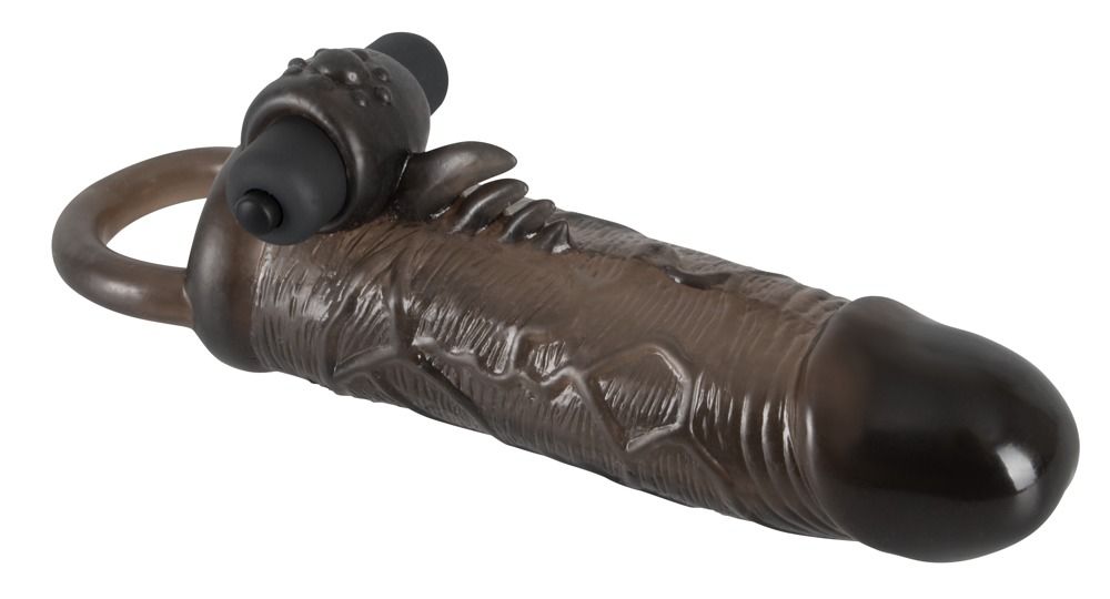 Schwarzes Verlängerungsstück mit Ring und Details. Oberteil mit Noppen und Aufsatz. Aus Silikon.