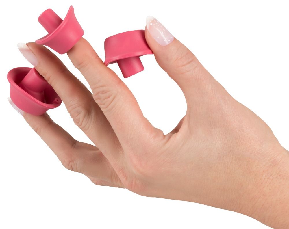 Drei rosa Ersatzköpfe werden von einer Hand gehalten. Die Köpfe sind pilzförmig mit einer runden Öffnung.
