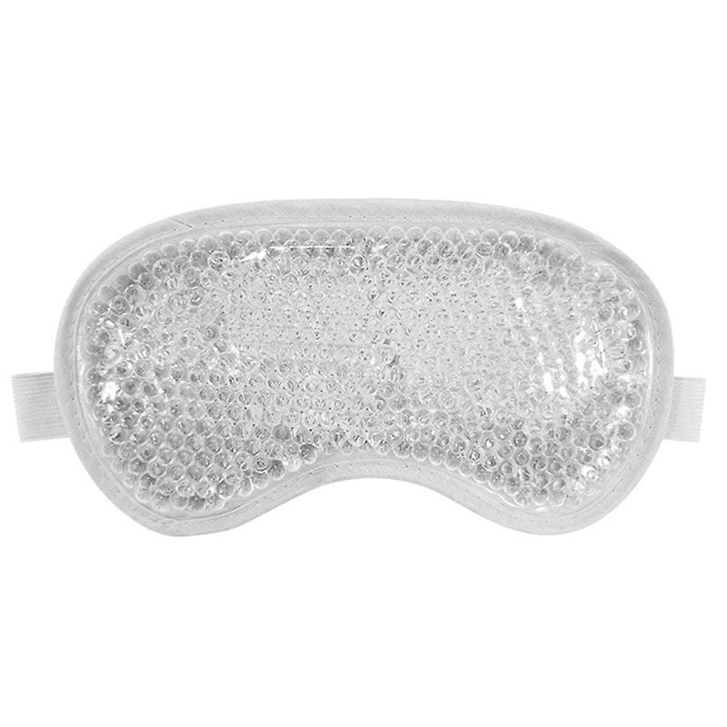 Graue Augenmaske mit Kühlgel-Perlen. Ovale Form mit elastischem Band. Detailansicht.