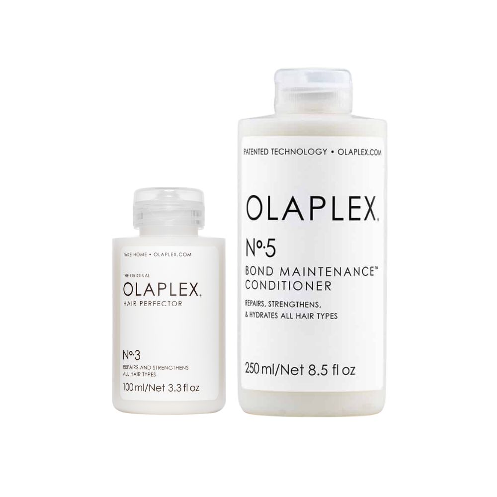 Zwei weiße Flaschen. Eine kleinere mit der Aufschrift "Olaplex No.3 Hair Perfector", eine größere mit "Olaplex No.5 Bond Maintenance Conditioner".