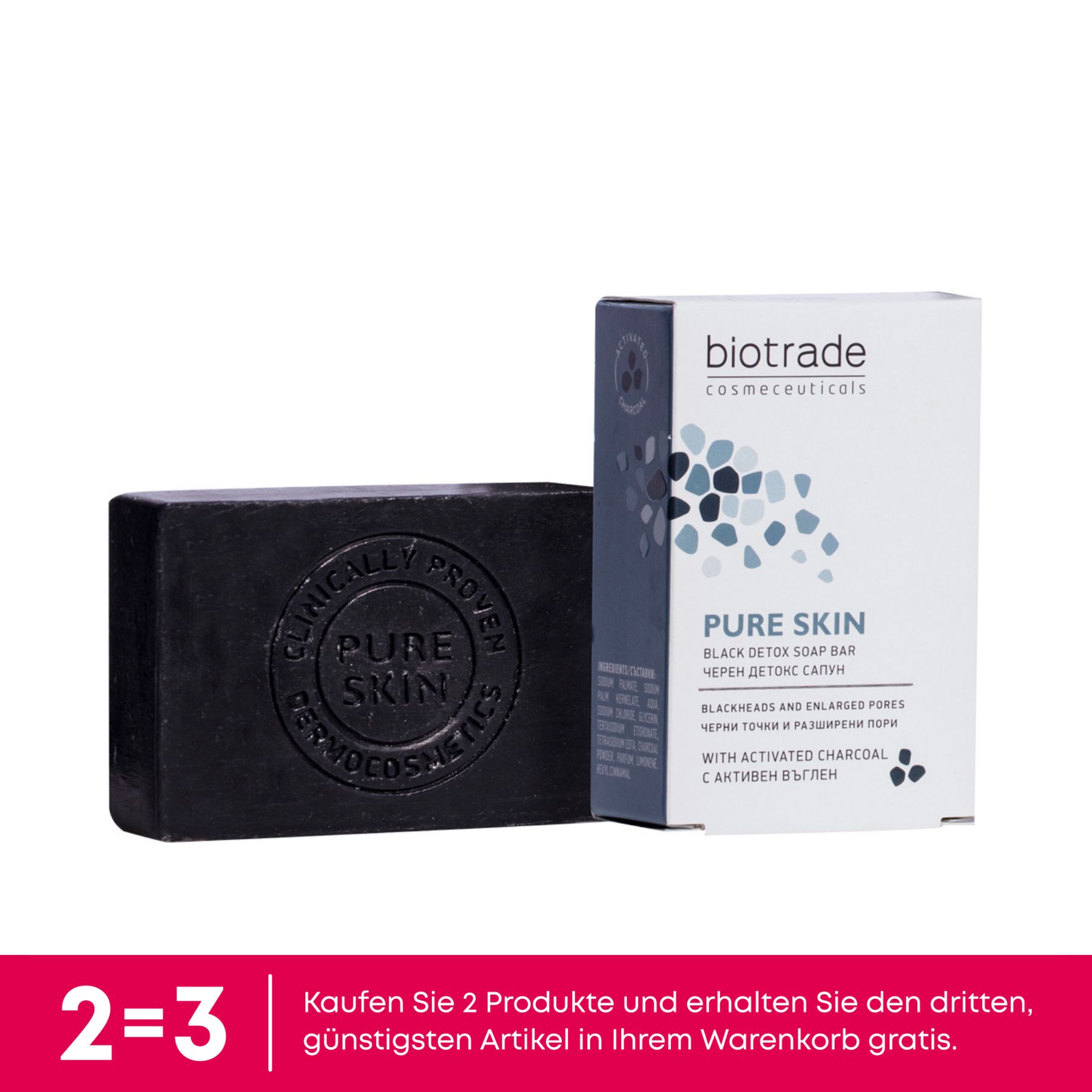 Schwarze Seife und Verpackung mit "Biotrade" und "Pure Skin".