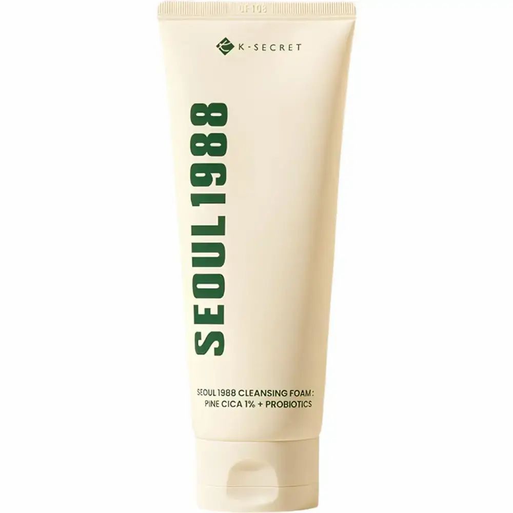 Creme-Tube mit grüner Schrift. Aufschrift: SEOUL 1988. K-SECRET Logo. Produktname.