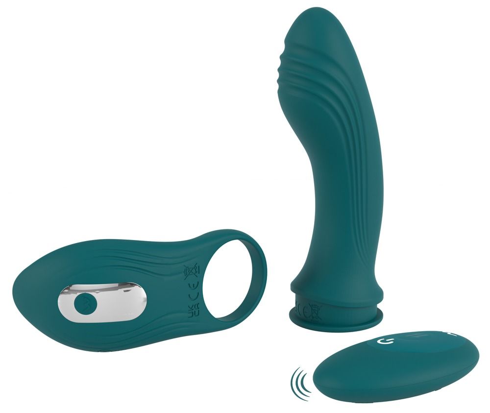Türkisfarbener Vibrator mit Ring und Fernbedienung. Der Vibrator hat eine gebogene Form mit geriffelter Oberfläche. Die Fernbedienung ist oval.