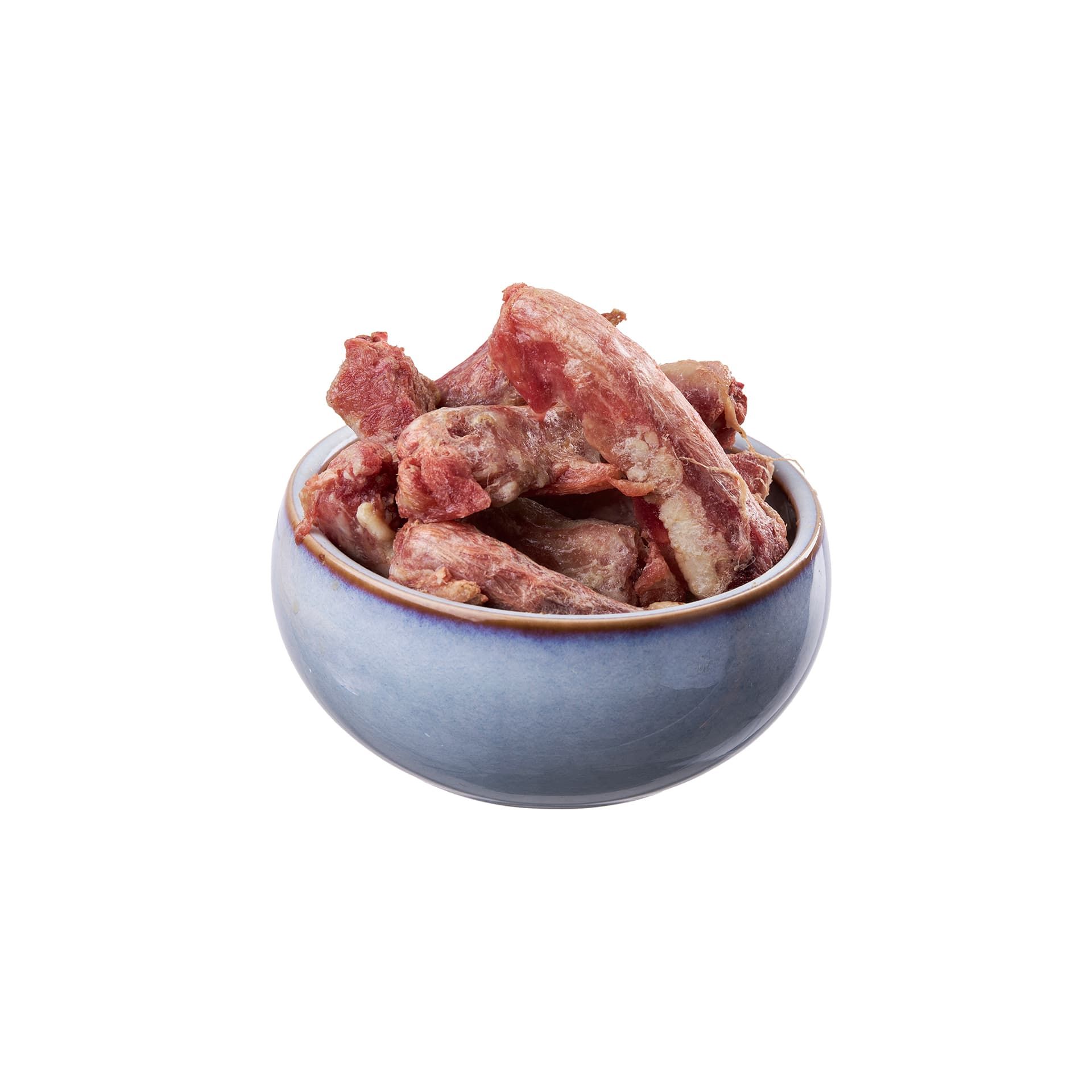 Schüssel mit rohen Fleischstücken.