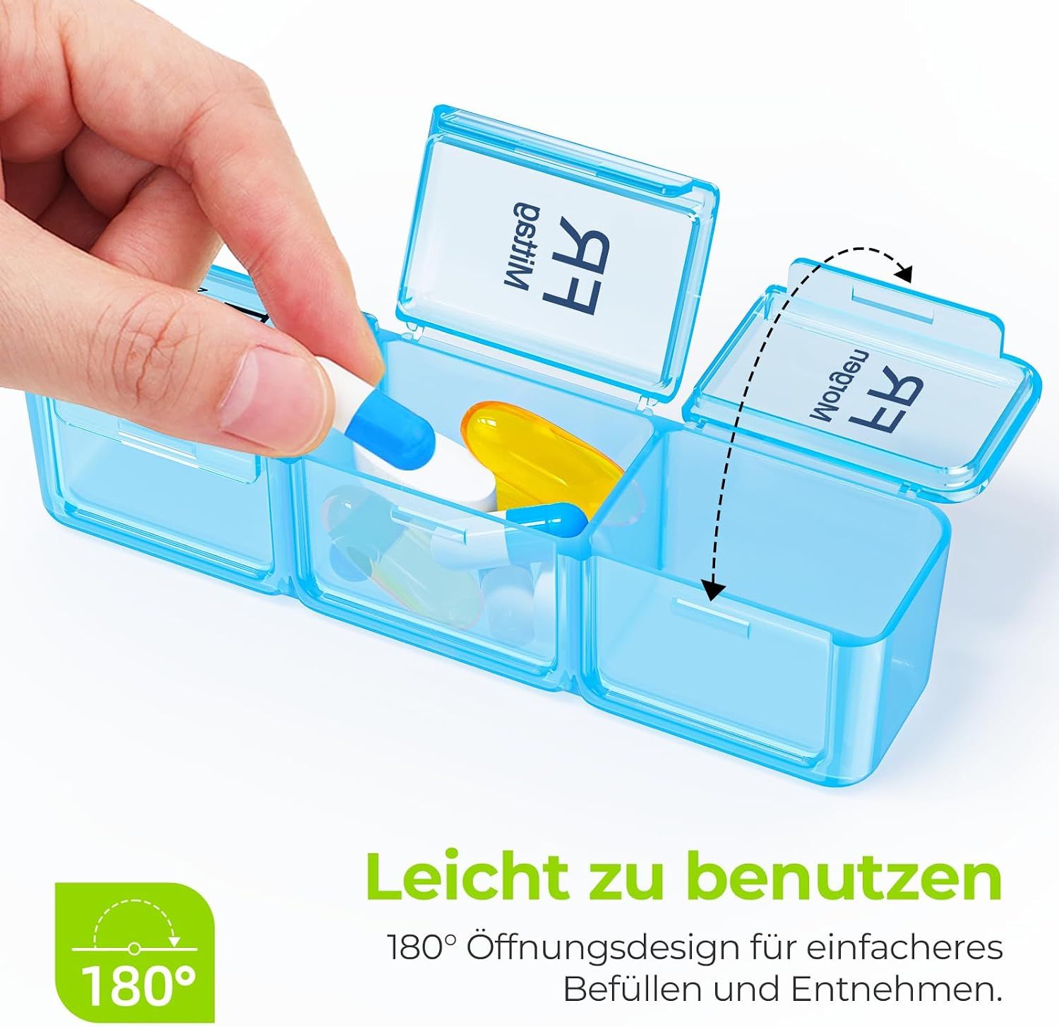 Transparenter blauer Pillenbehälter mit drei Fächern, der befüllt wird.
