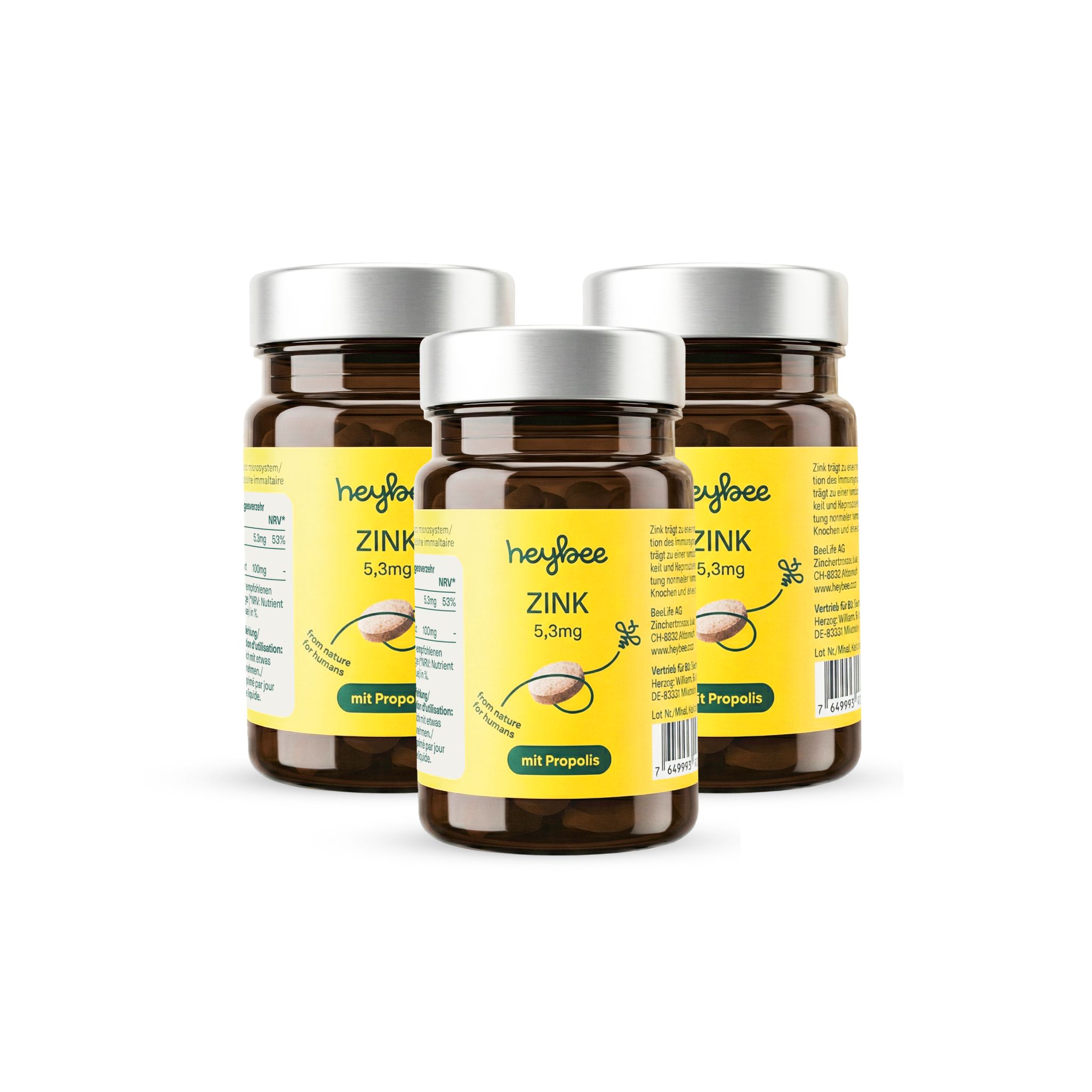 Drei braune Glasflaschen mit gelben Etiketten. Aufschrift: Zink 5,3mg mit Propolis.
