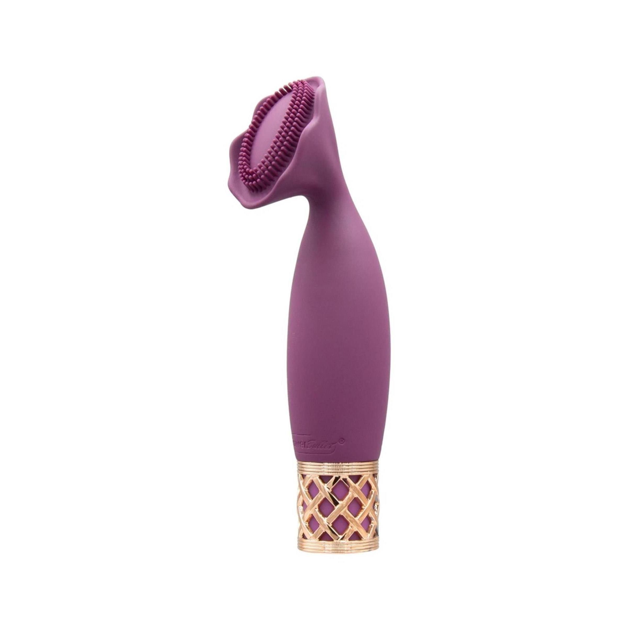 Lila Vibrator mit goldfarbenem Gittermuster am Griff. Oben ein blütenförmiger Aufsatz.